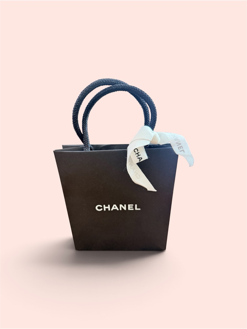 CHANEL Black Mini paper Bag with White Ribbon Accent